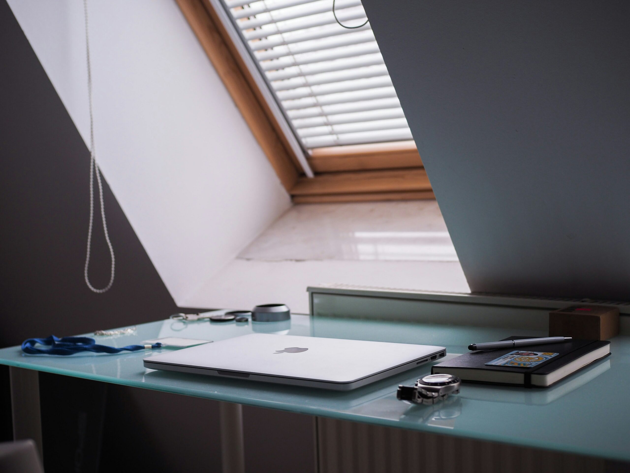 A desk in the foreground with a skylight in the background
